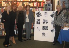 Copacabana alumnae pose with some Copa memorabilia